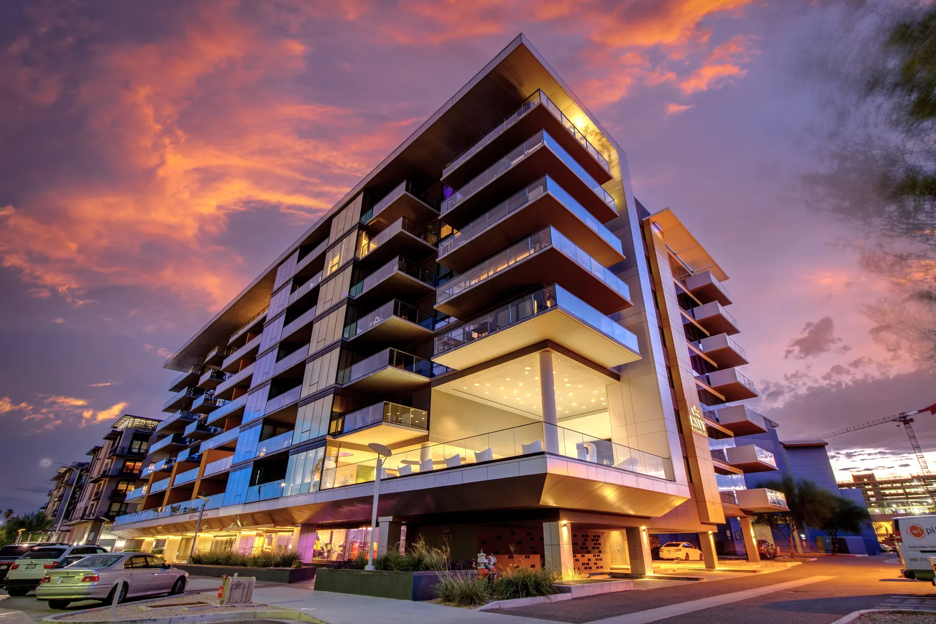 Envy Residences condominium tower at dusk in Old Town Scottsdale